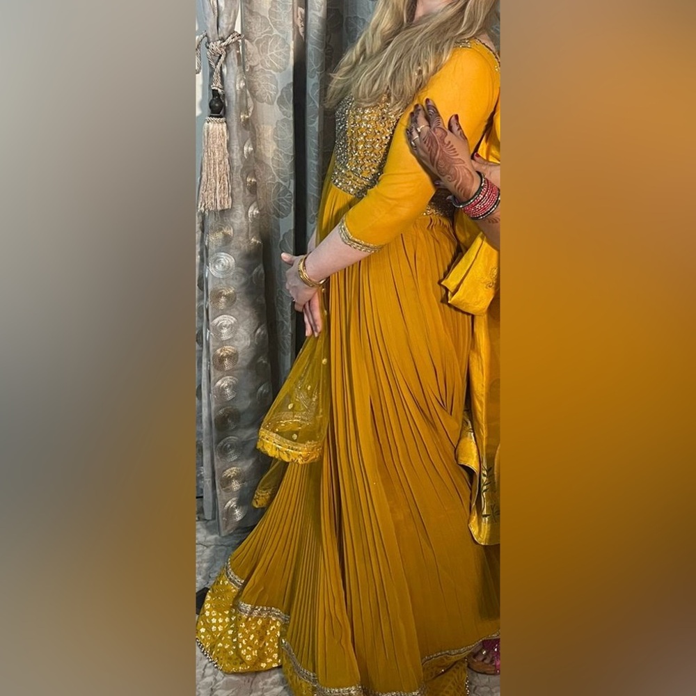 Elegant Mustard Yellow Lehenga with Silver Embellishments
